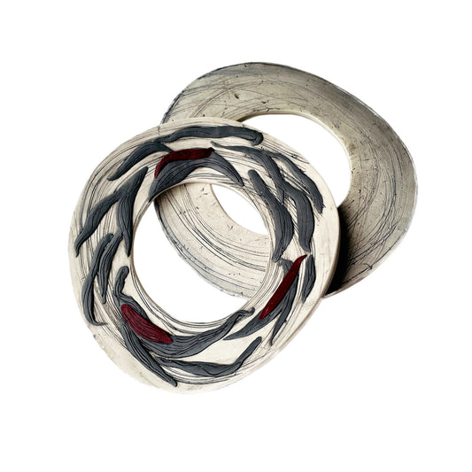 White polymer clay cuffs with grey and red accents