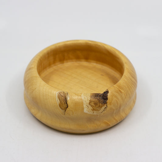 Wooden bowl with organic wood knots 