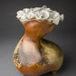 Abstract vase with clay white roses 