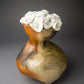 Abstract vase with clay white roses 