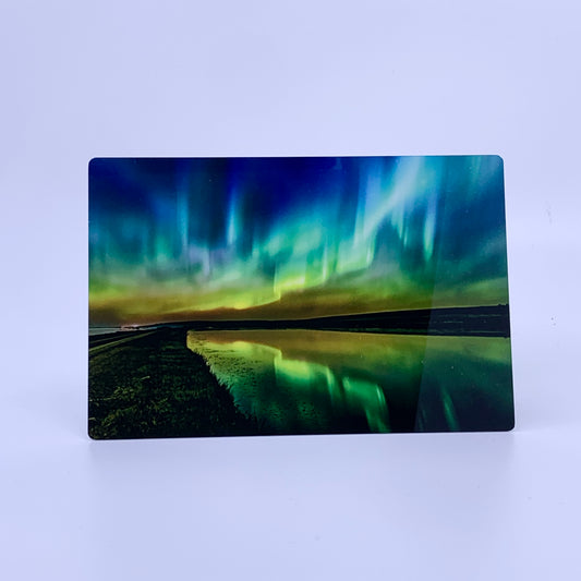 Northern Lights over a Lake at night