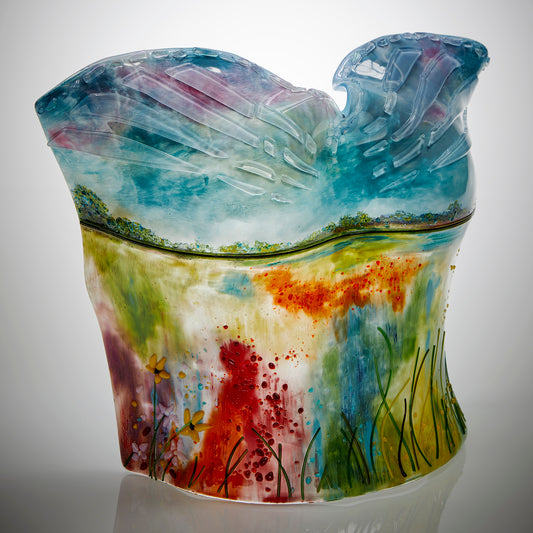 Glass bust of a prairie scene 