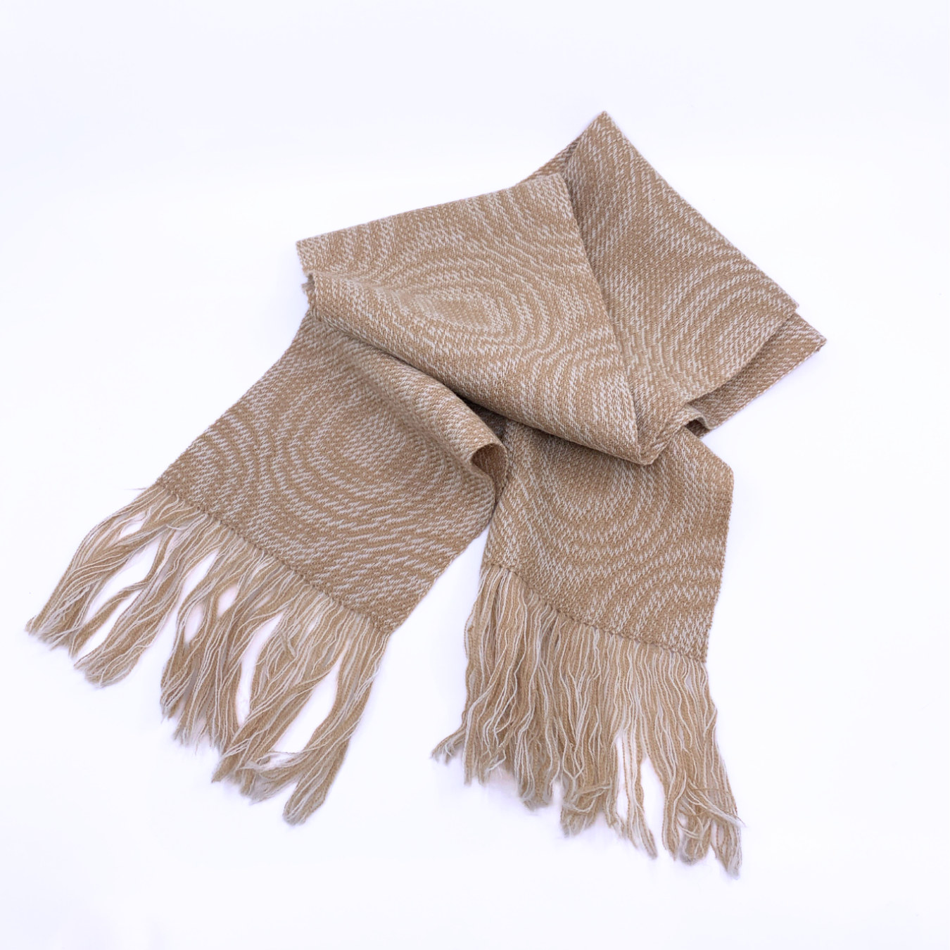 tan and white hand-woven scarf 