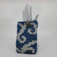 Tumbling Curls Wrist Pouch