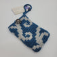 Tumbling Curls Wrist Pouch