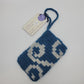 Tumbling Curls Wrist Pouch