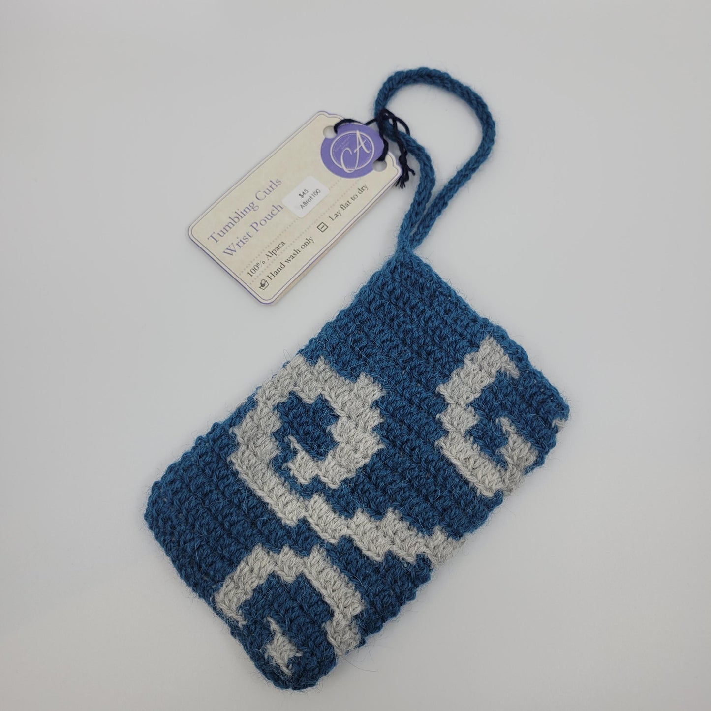 Tumbling Curls Wrist Pouch