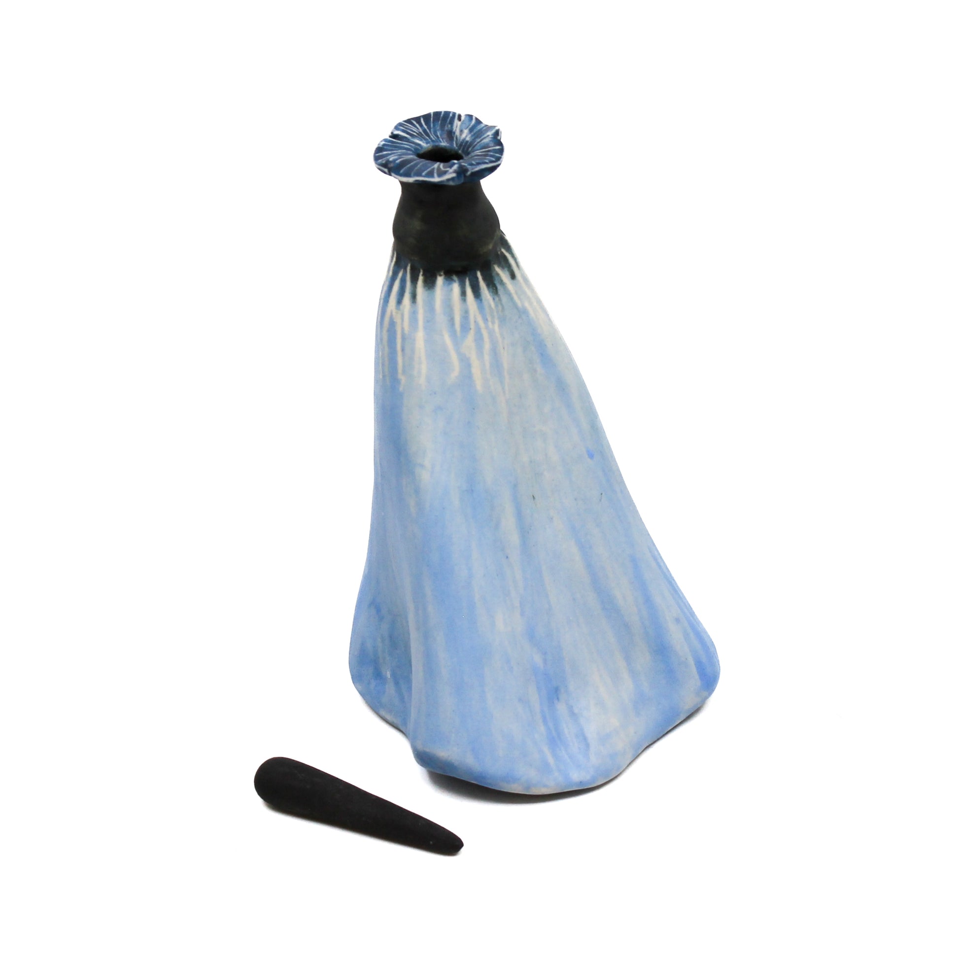 Light blue pod bottle with black stopper