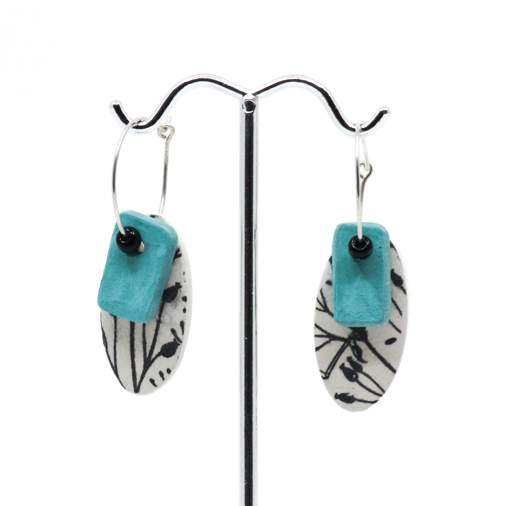 Teal,  black and white earrings