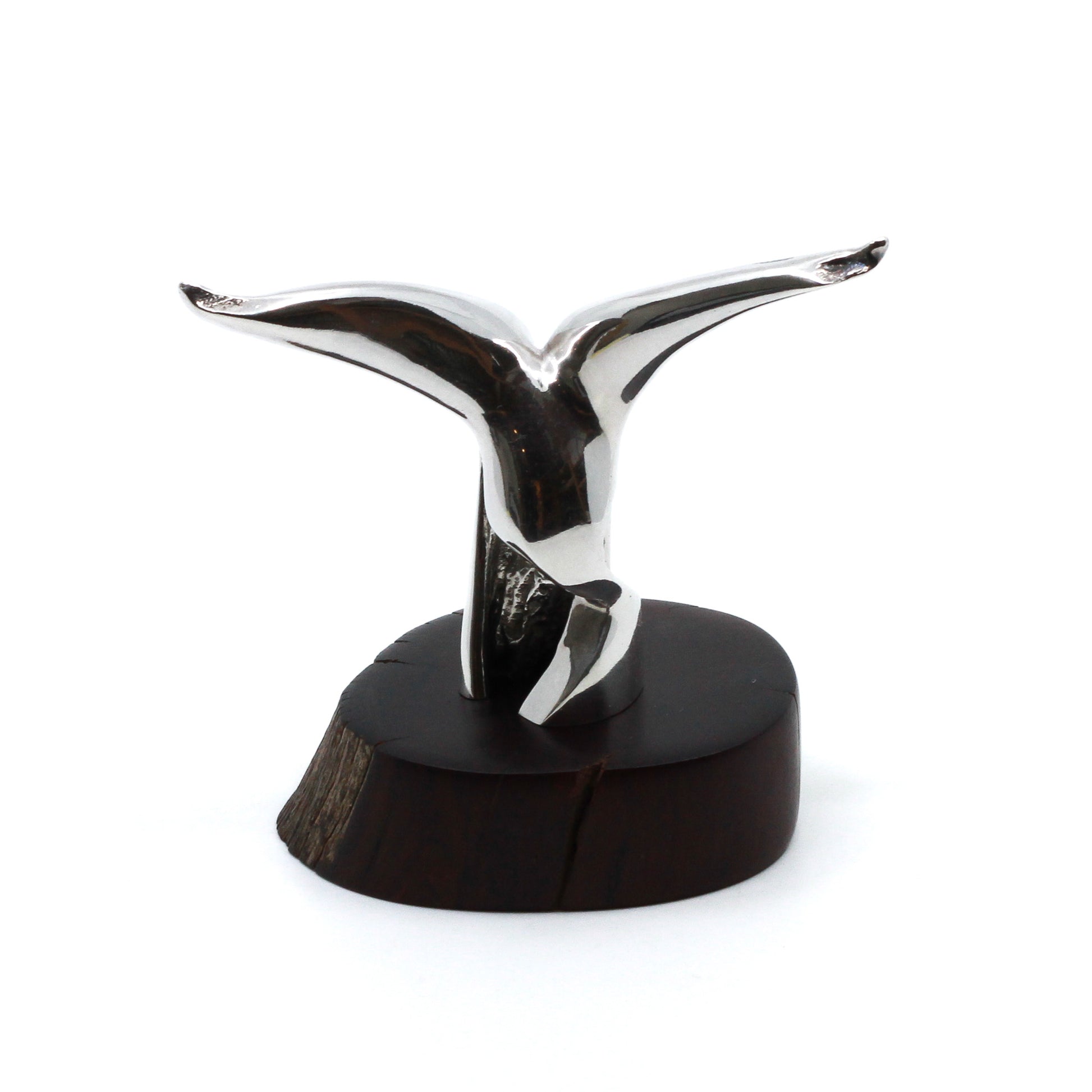 Silver modern miniature statue on wood stand