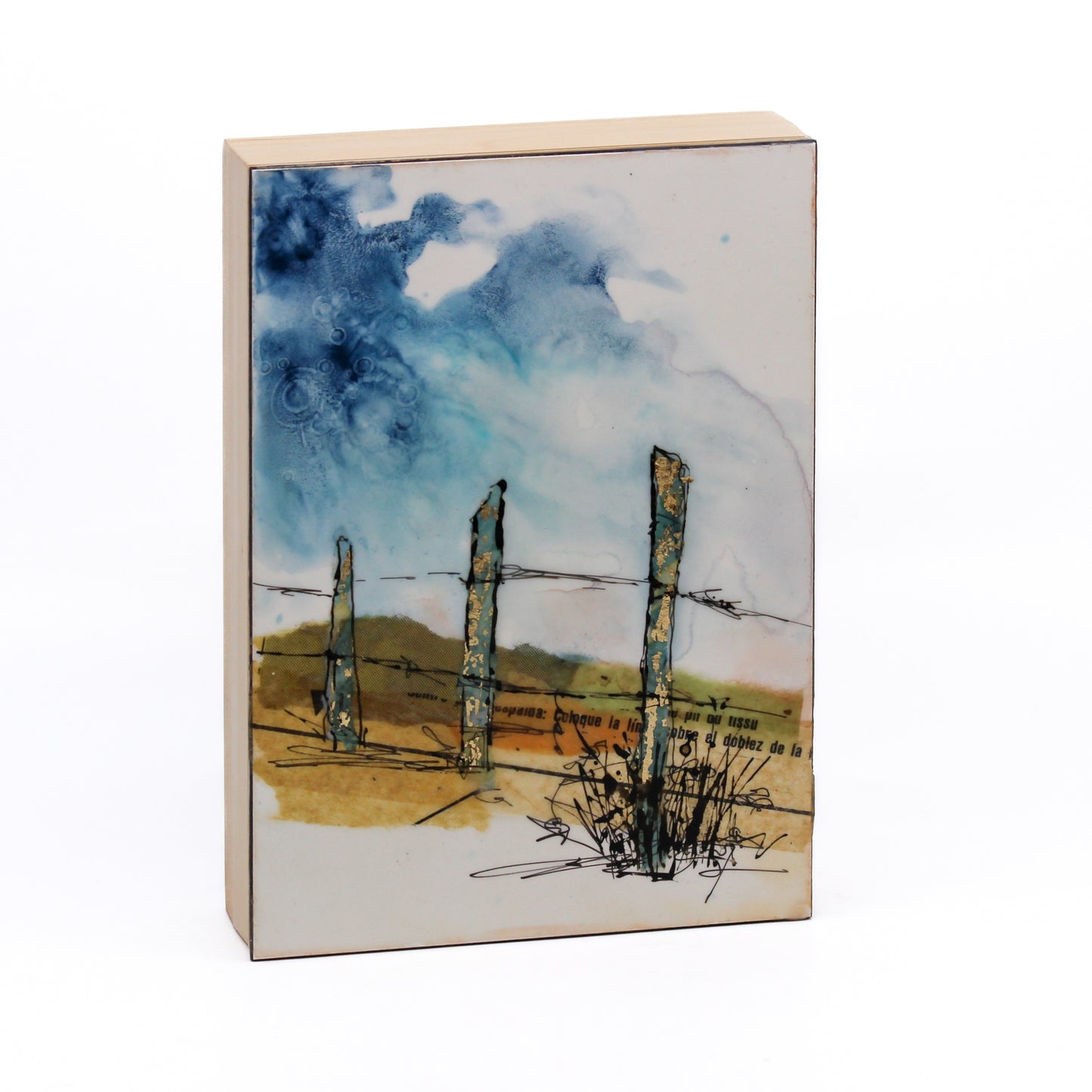 Encaustic of a fenceline with gold leaf 