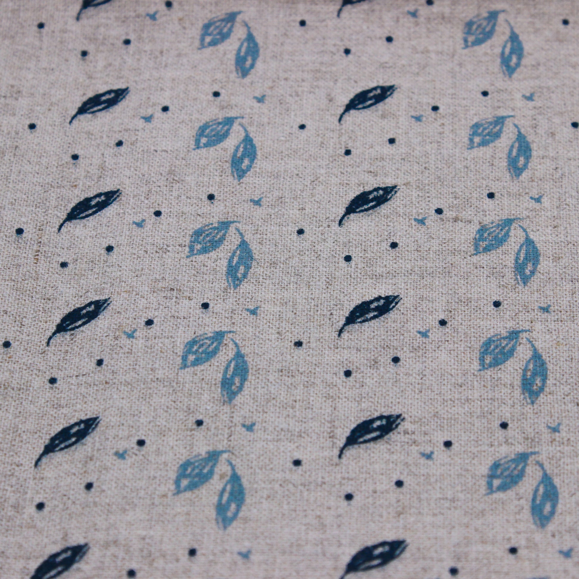 blue leaf print on grey towel 