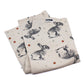 Tea towel with bunnies and small flowers and leaves