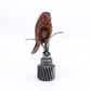 Wooden chickadee on metal stand