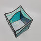 interior view of blue stained glass box
