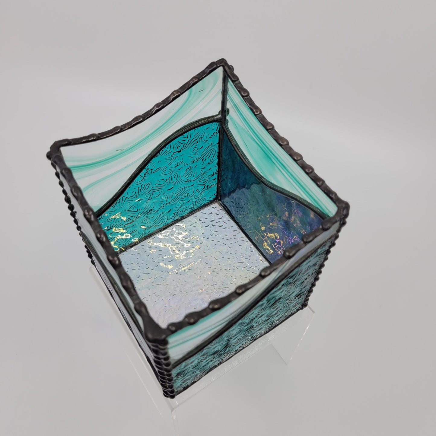 interior view of blue stained glass box