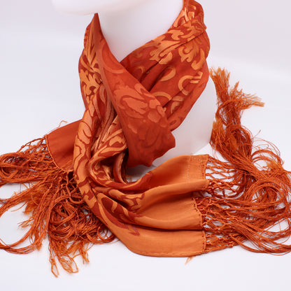 orange scarf with long tassels 