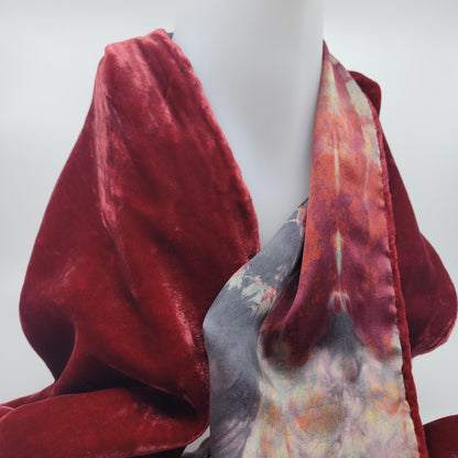 Red velvet scarf with an abstract pattern on a white background