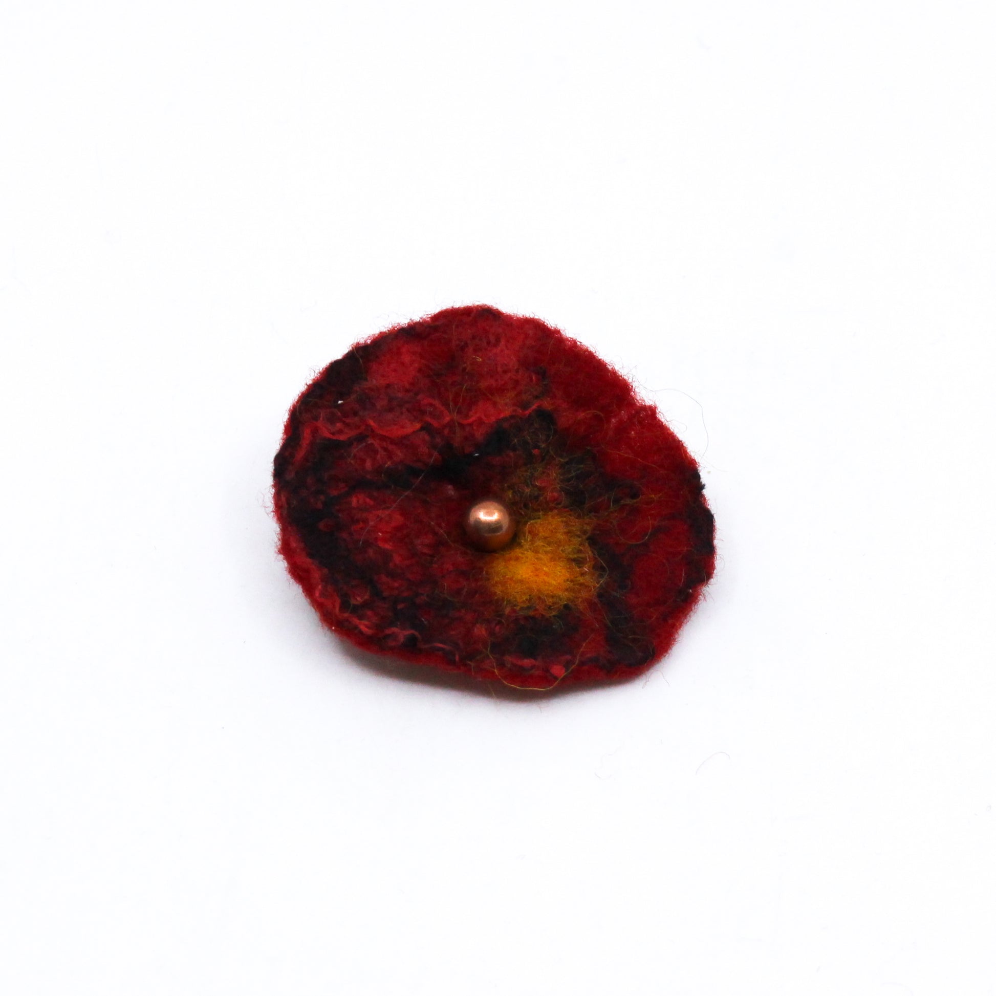 Felted poppy with gold bead