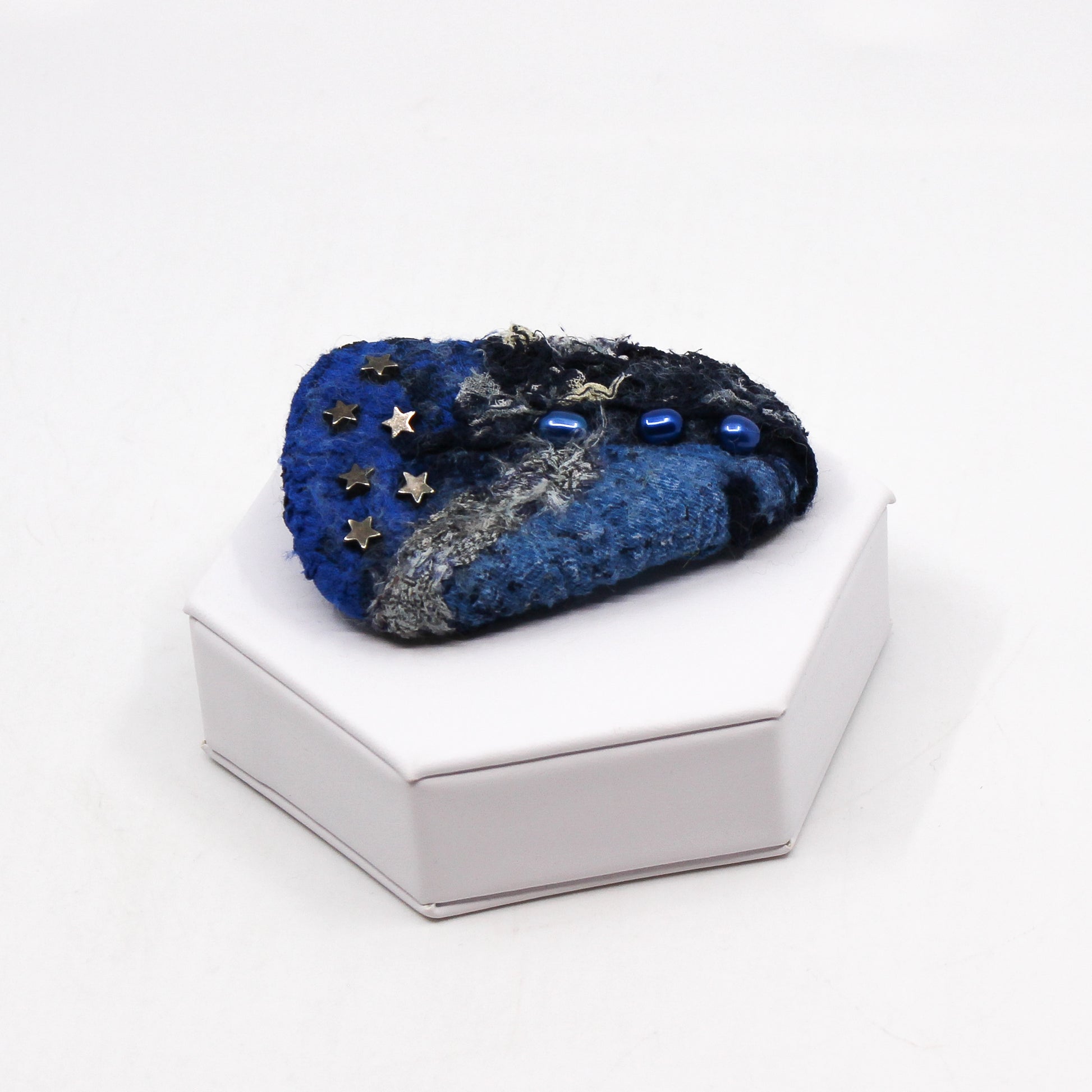 Blue triangle felted brooch with beads
