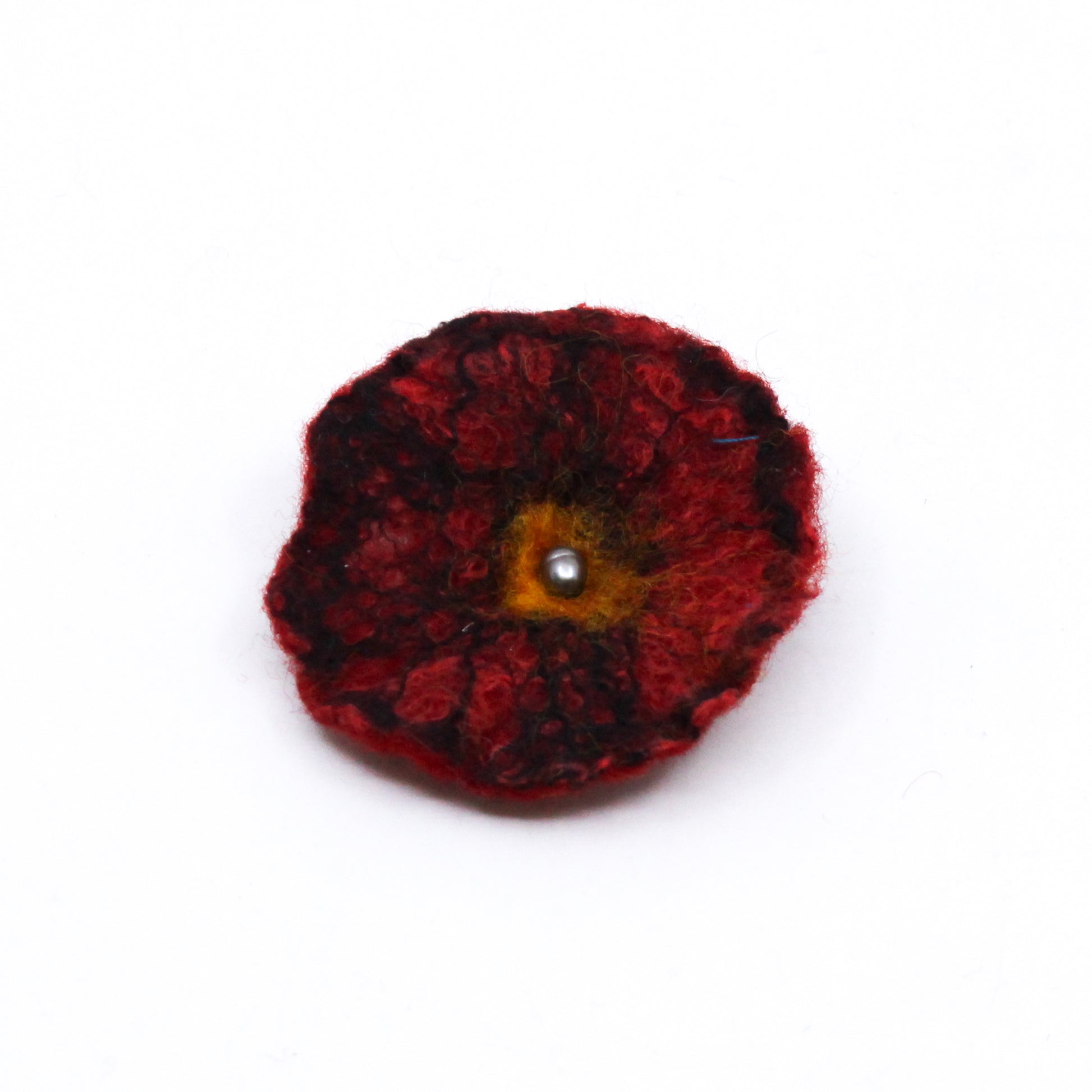 Felted poppy with silver bead