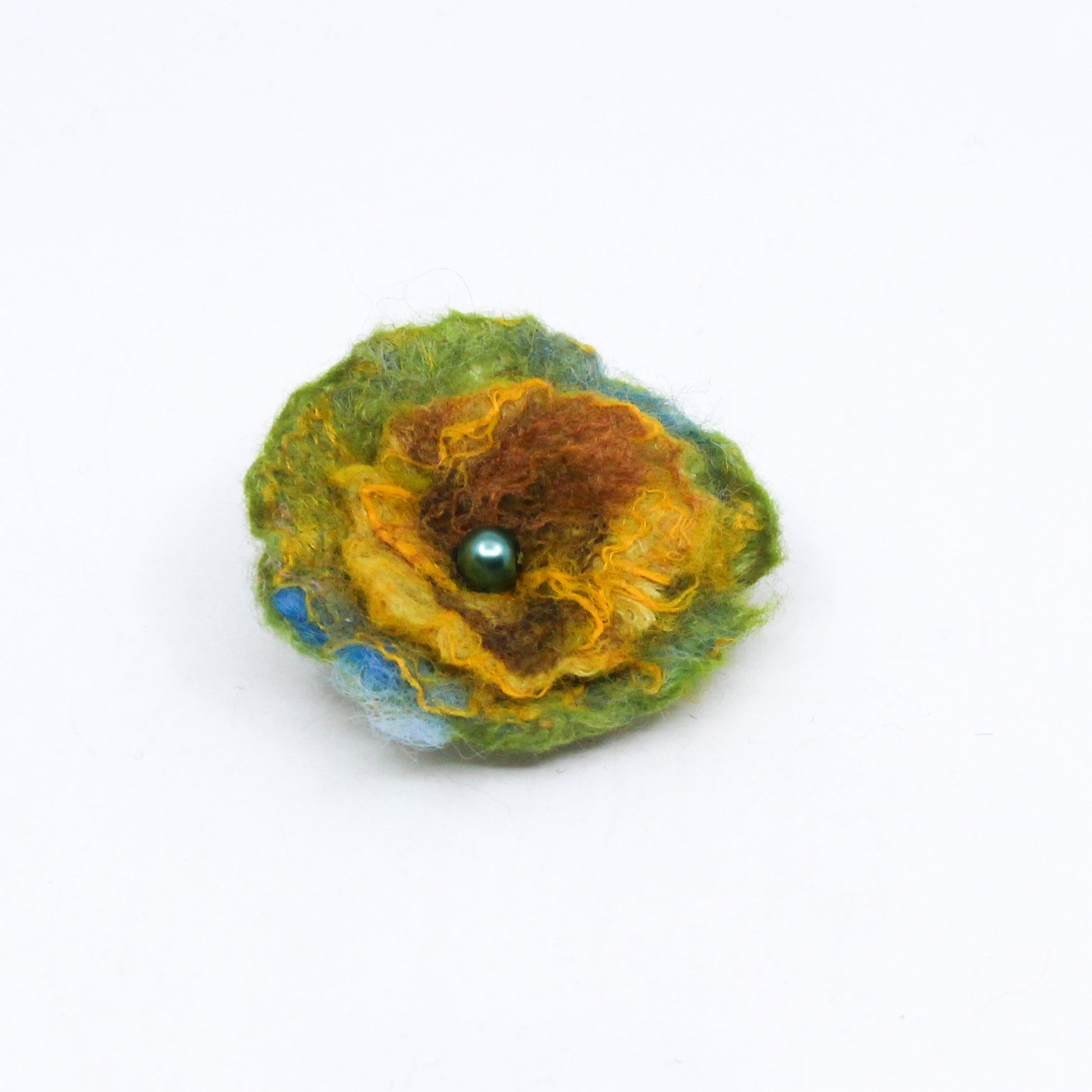 yellow and green flower pin
