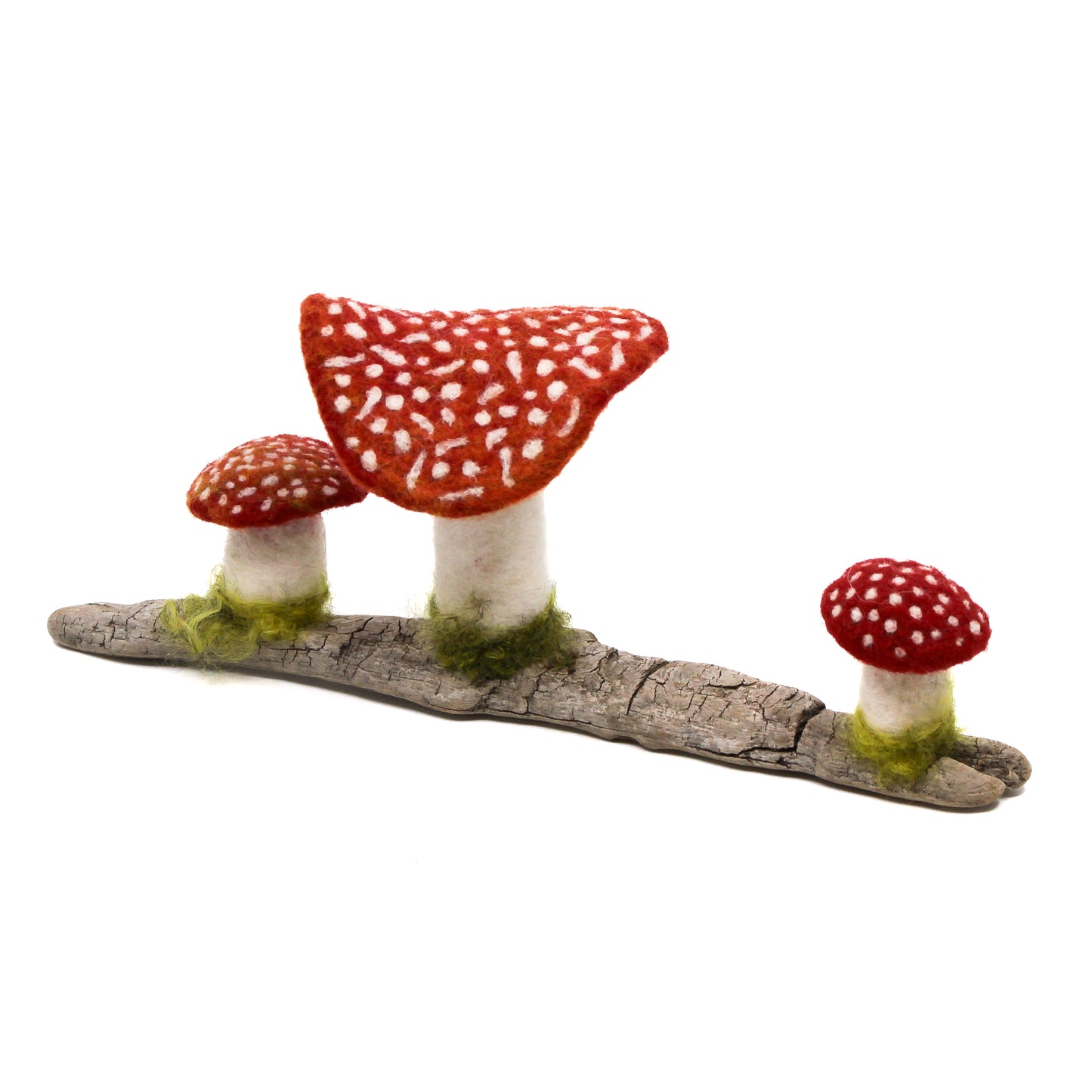 Three felted mushroom on piece driftwood