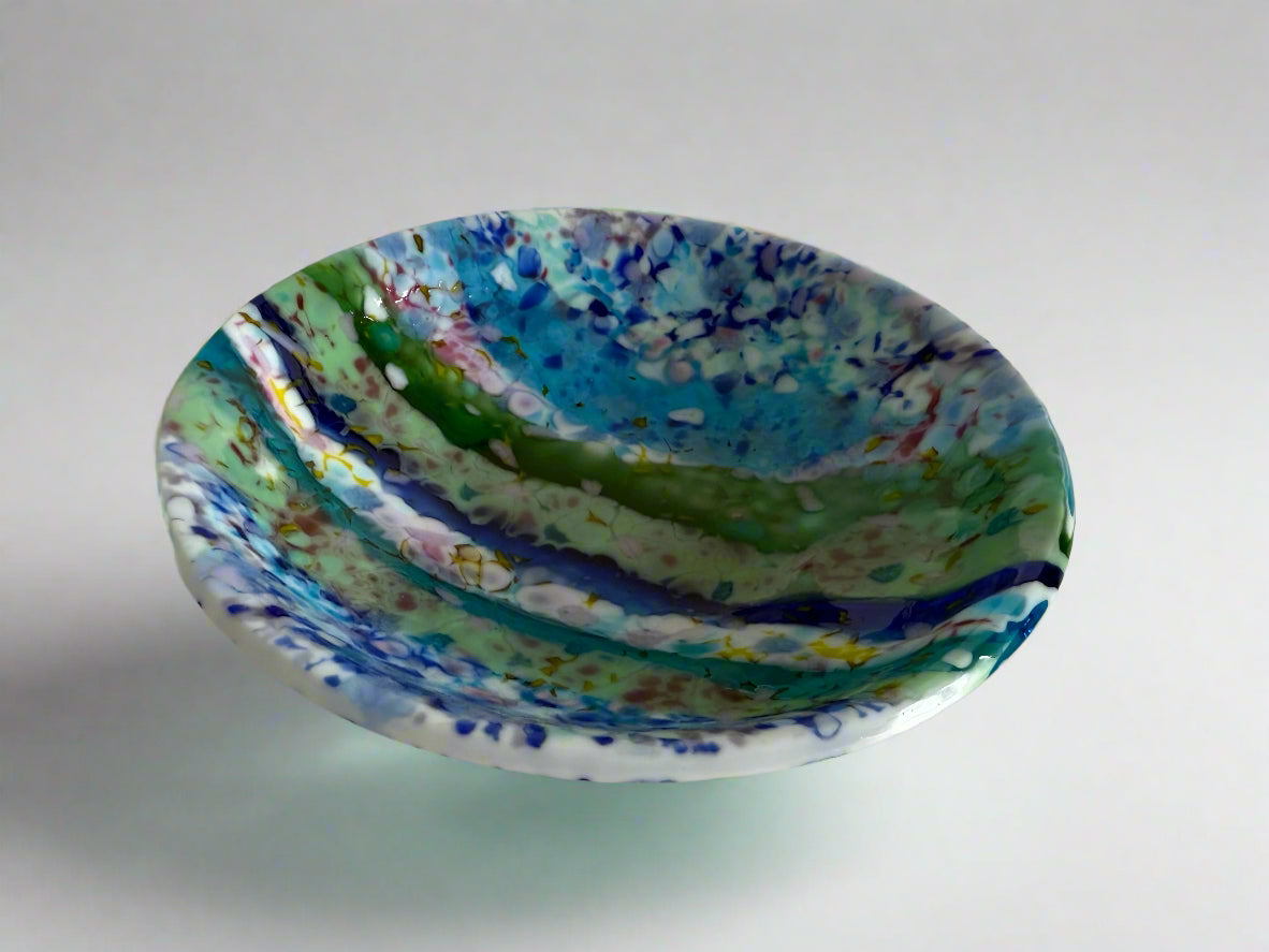 Colorful ceramic bowl on a white background