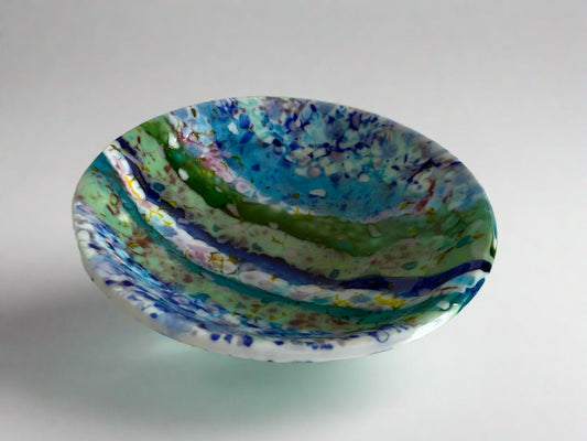 Colorful ceramic bowl on a white background