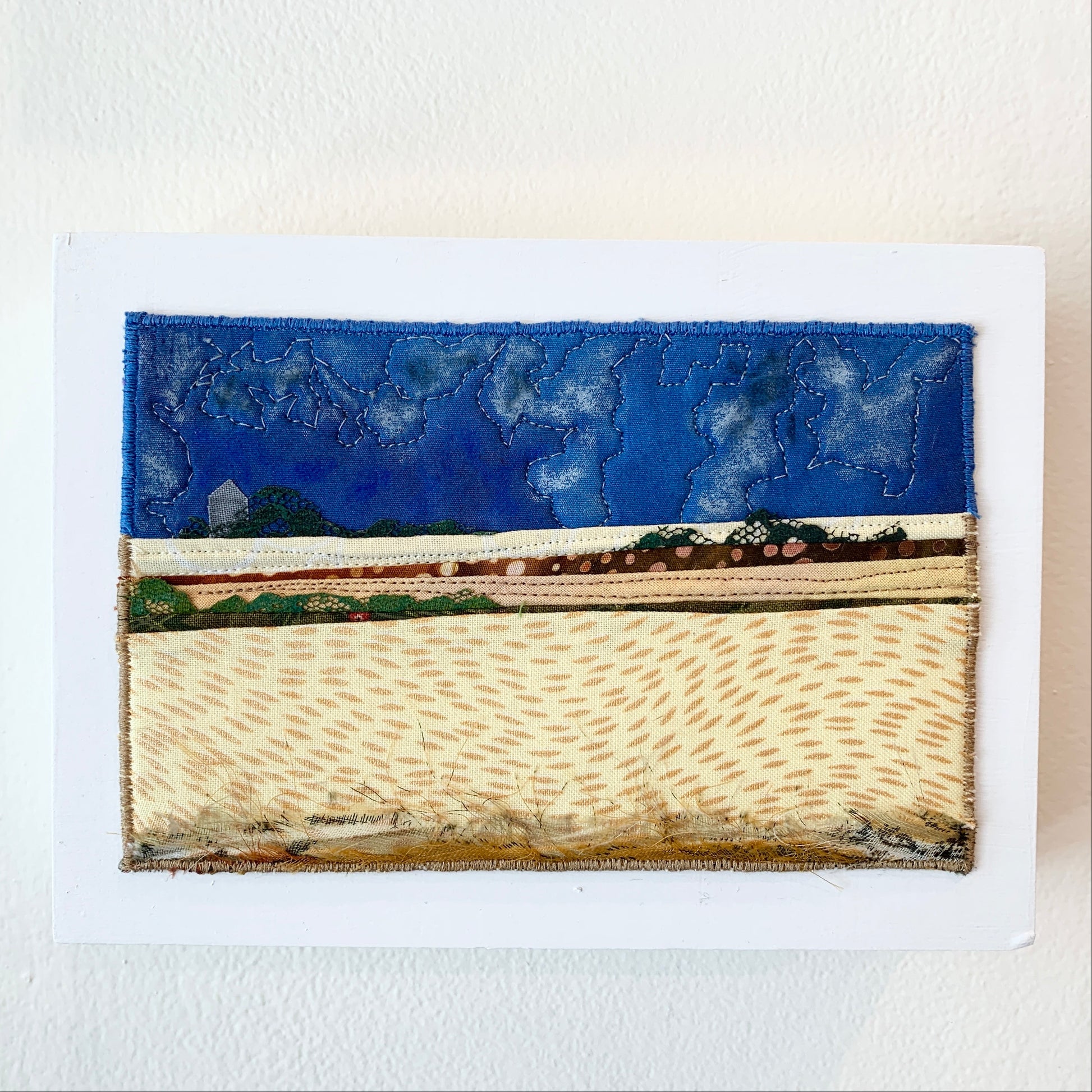 Blue and Brown fiber art of a Saskatchewan landscape