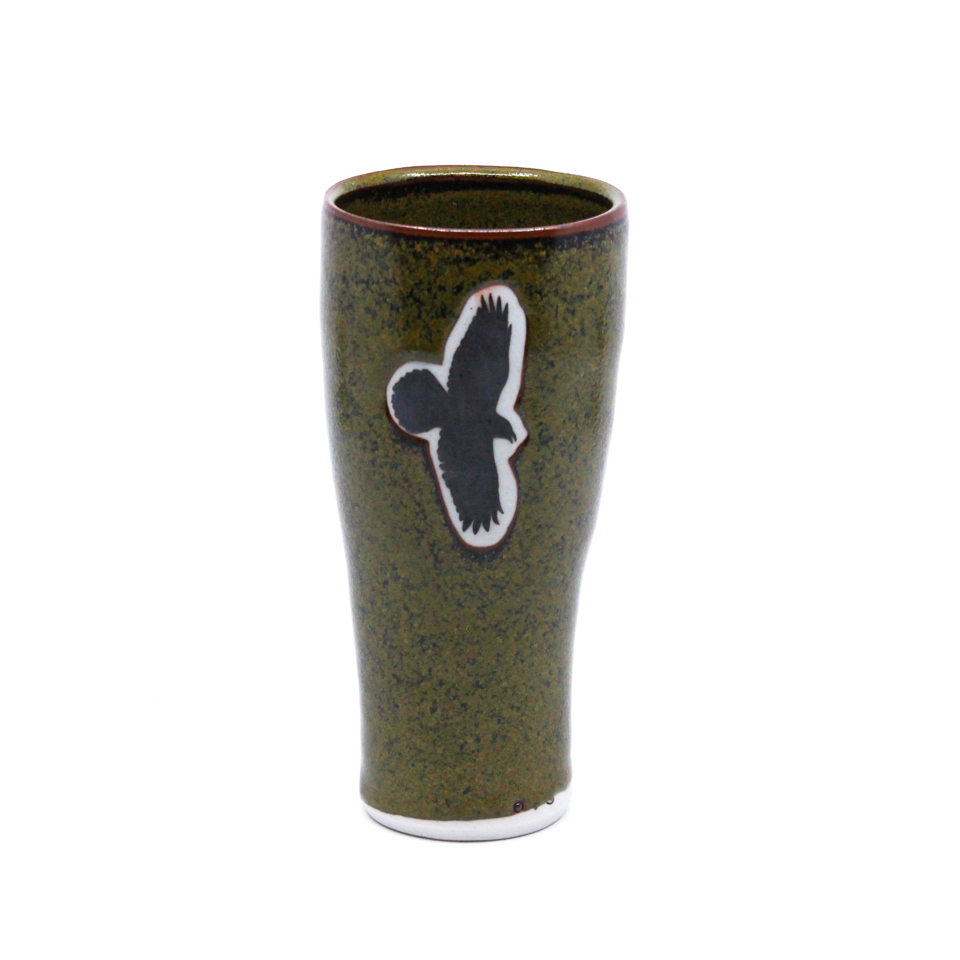 Tall clay cup with silhouette of raven flying: green