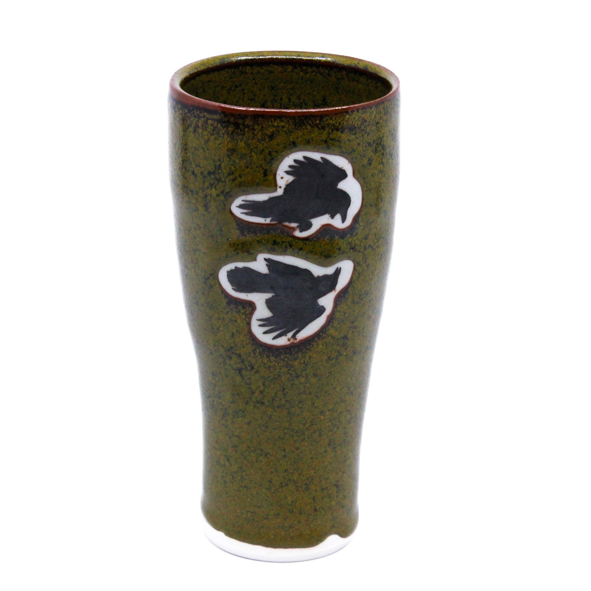 Tall clay cup with silhouette of raven flying: green