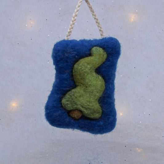 Green tree on blue, felted ornament