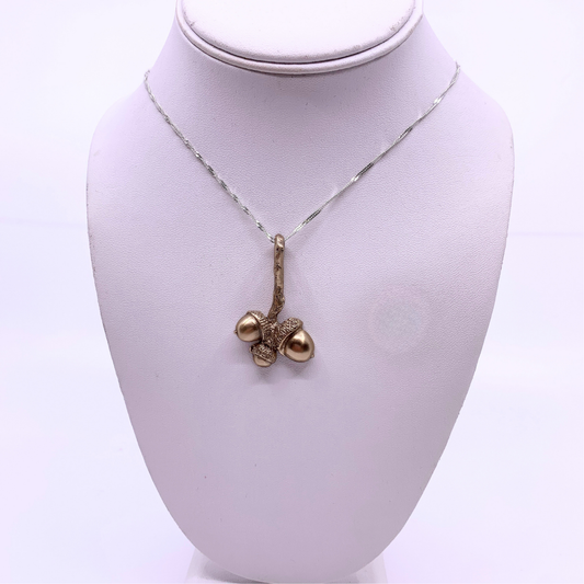 Bronze trio of acorns on a necklace 
