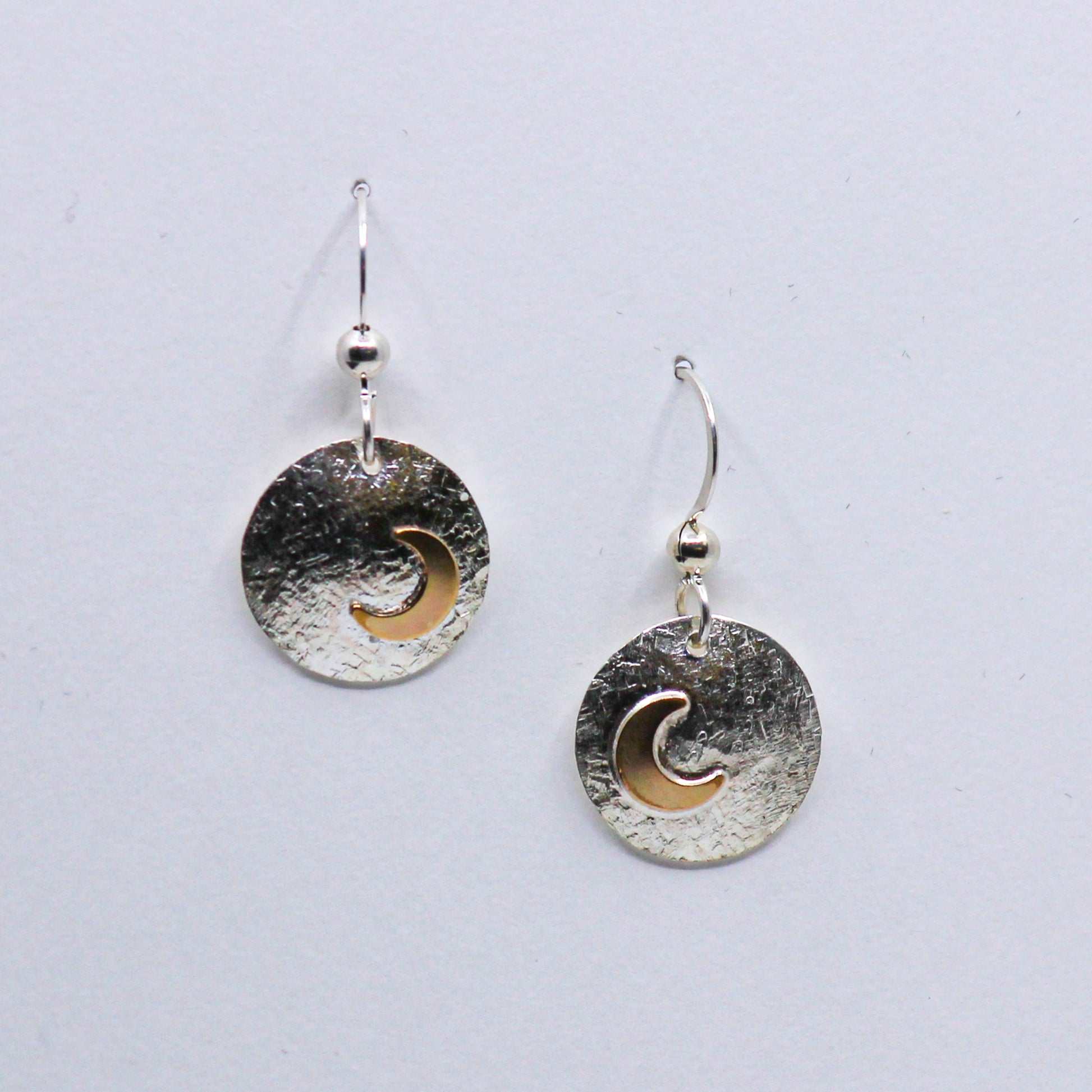 Dangly silver earrings, round hammered silver discs with gold crescent moons