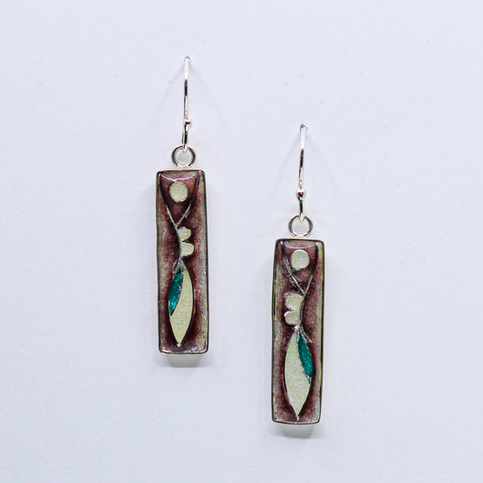 cream and teal figure on roan background earrings 