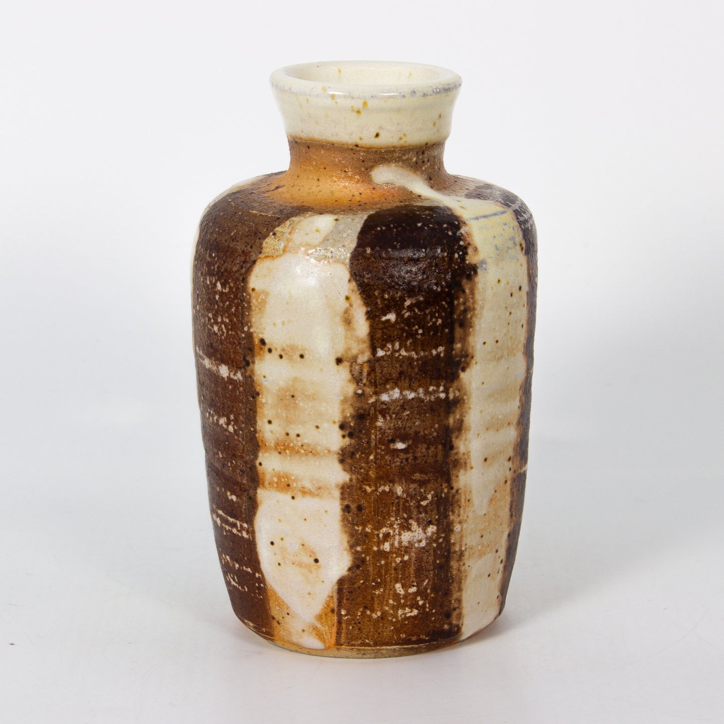 Ceramic vase with brown and beige glaze on a white background