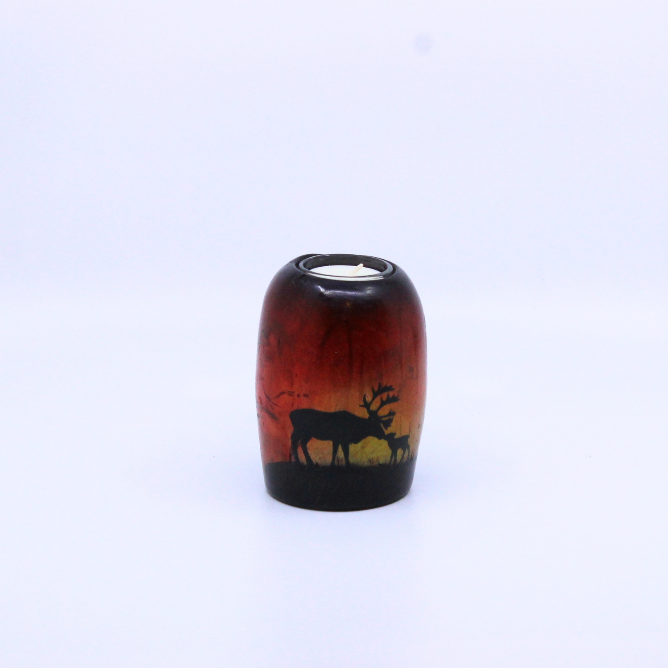 candle holder with silhouette of caribou doe and calf 