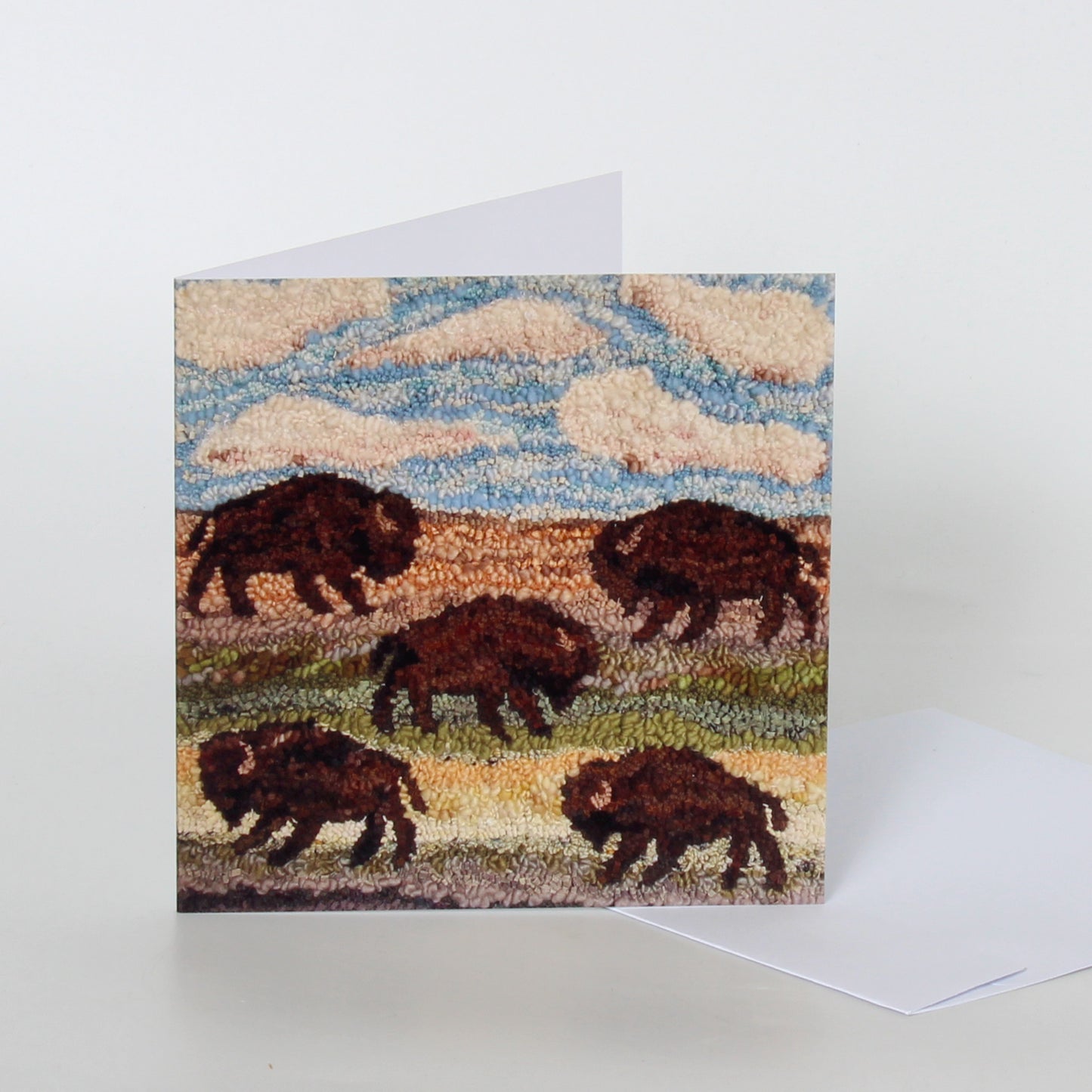 Greeting card with a design of bison on a textured background