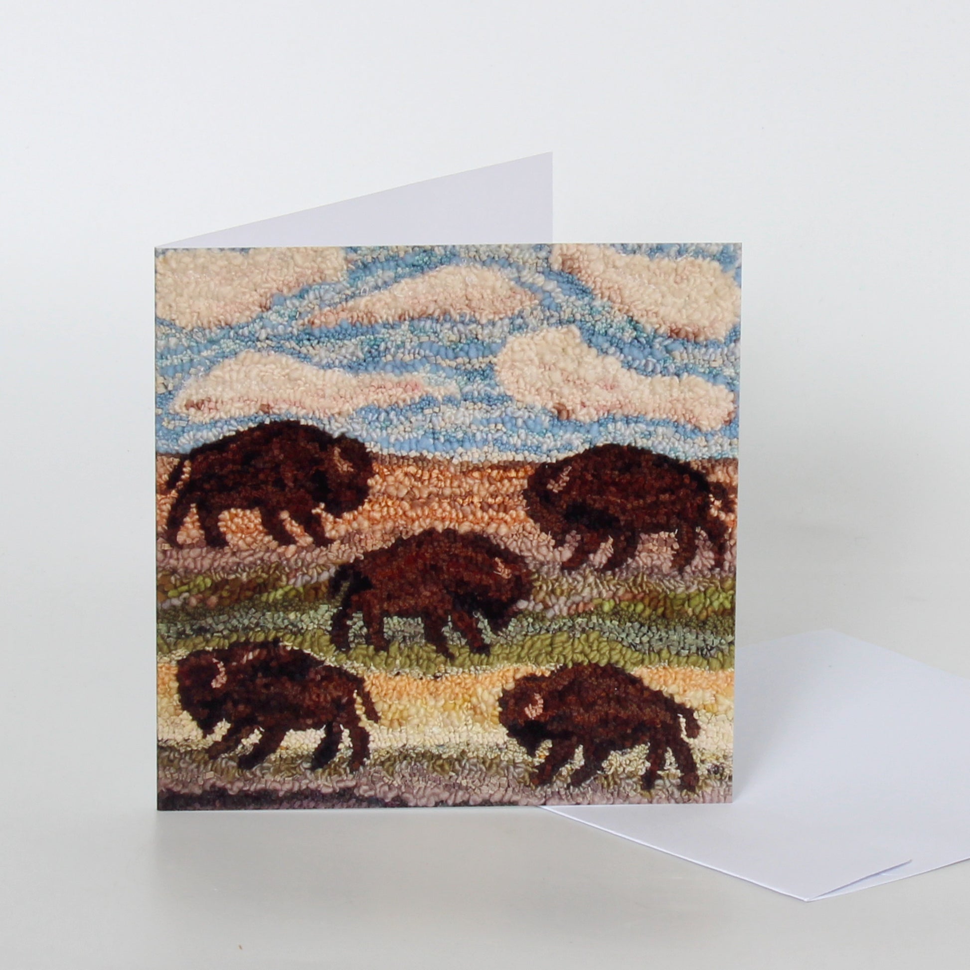 Greeting card with a design of bison on a textured background