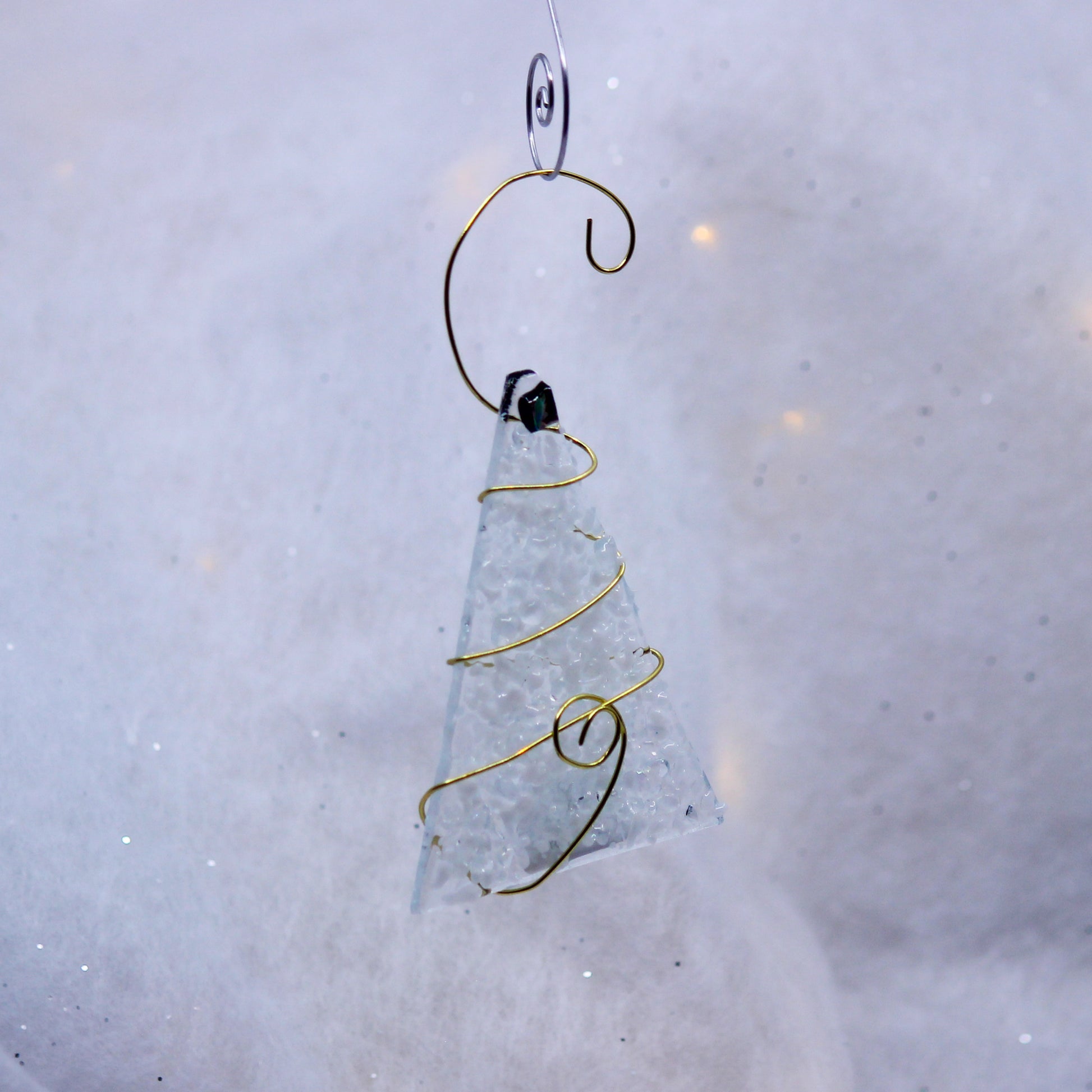 White glass tree with blue star. Ornament 