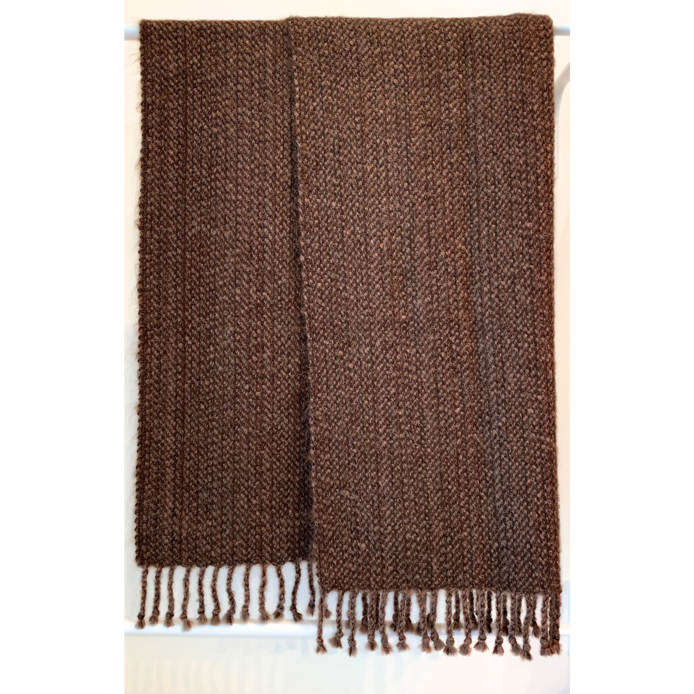 brown handwoven blanket 