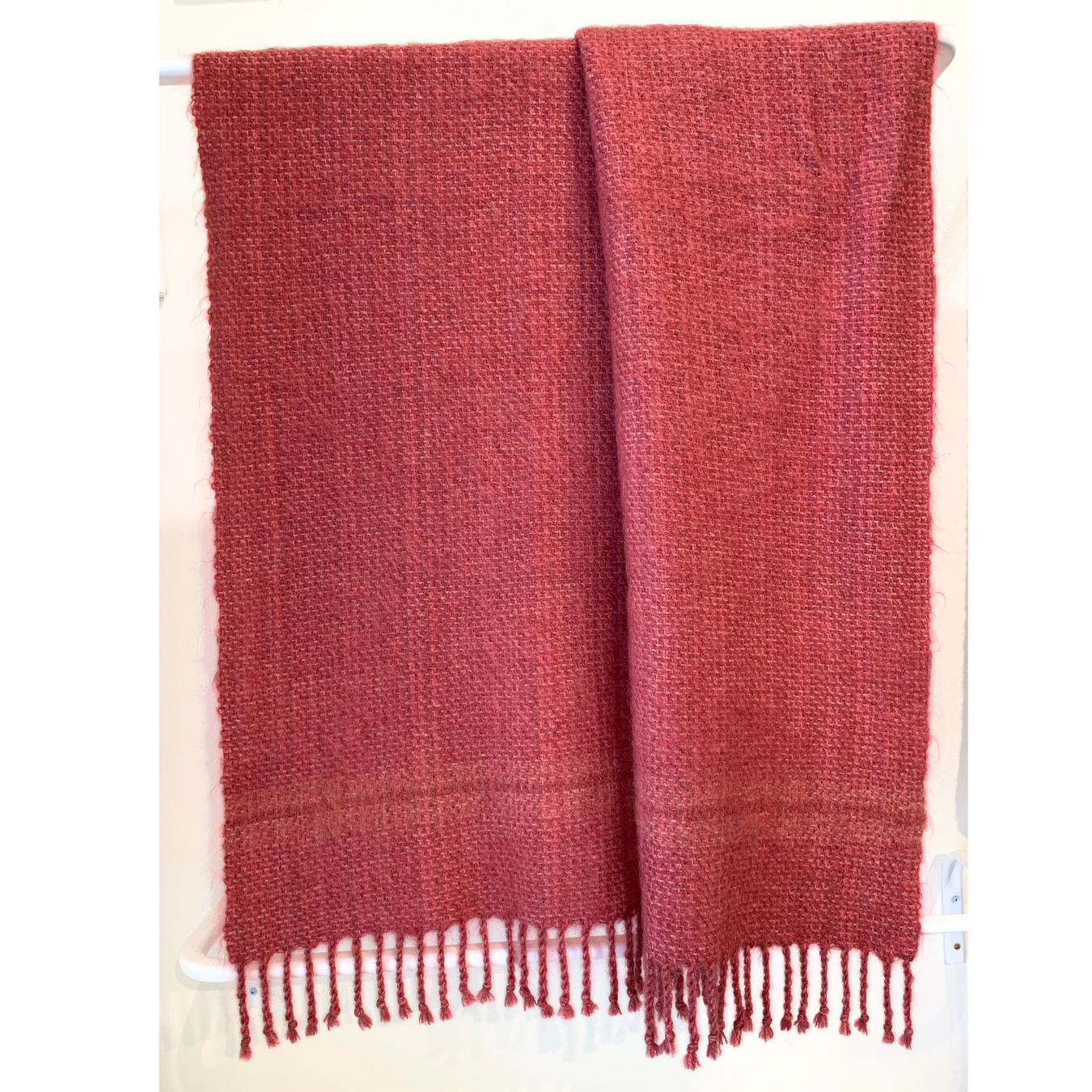 pink handwoven blanket 