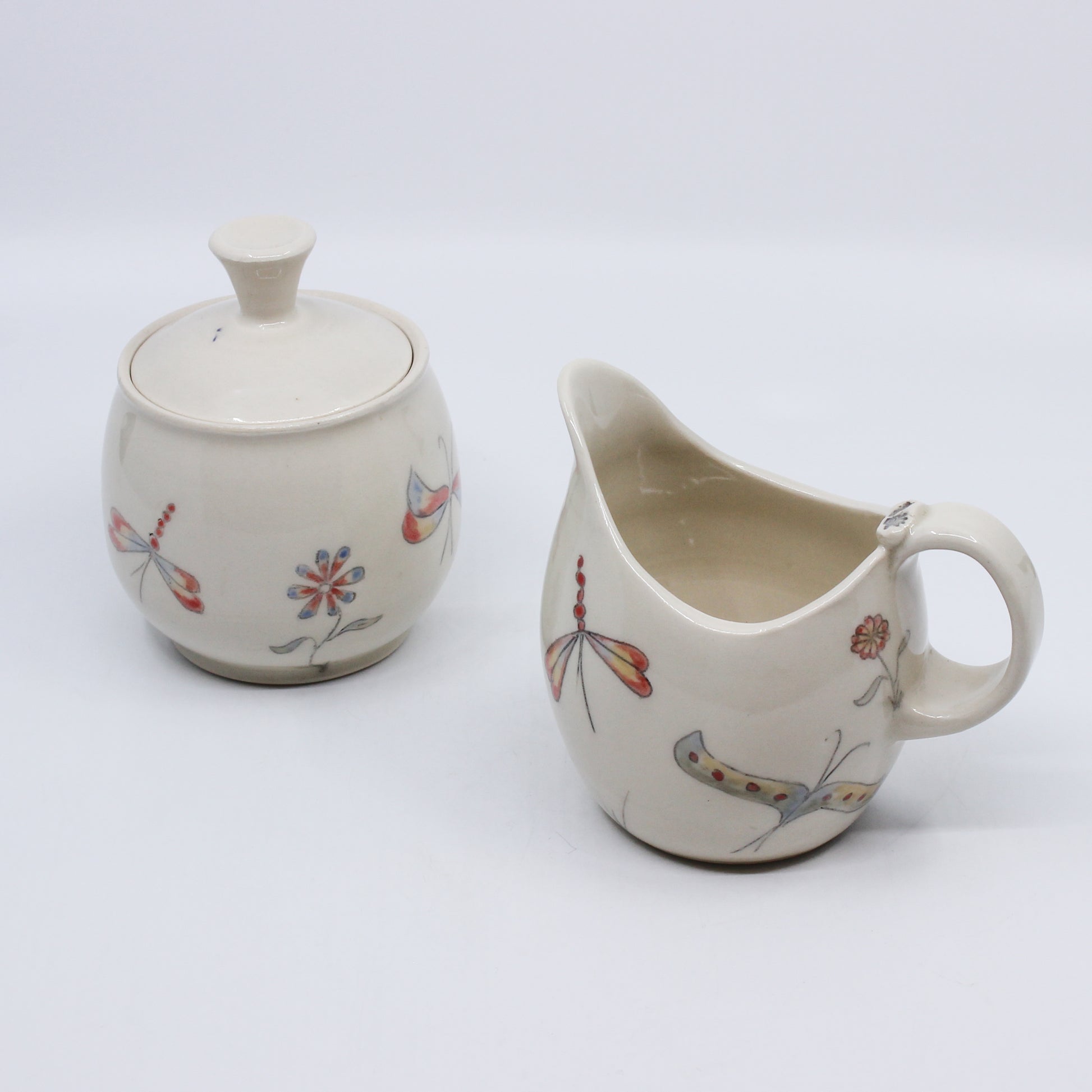 Alternate image of creamer and sugar bowl with hand painted insects and flowers