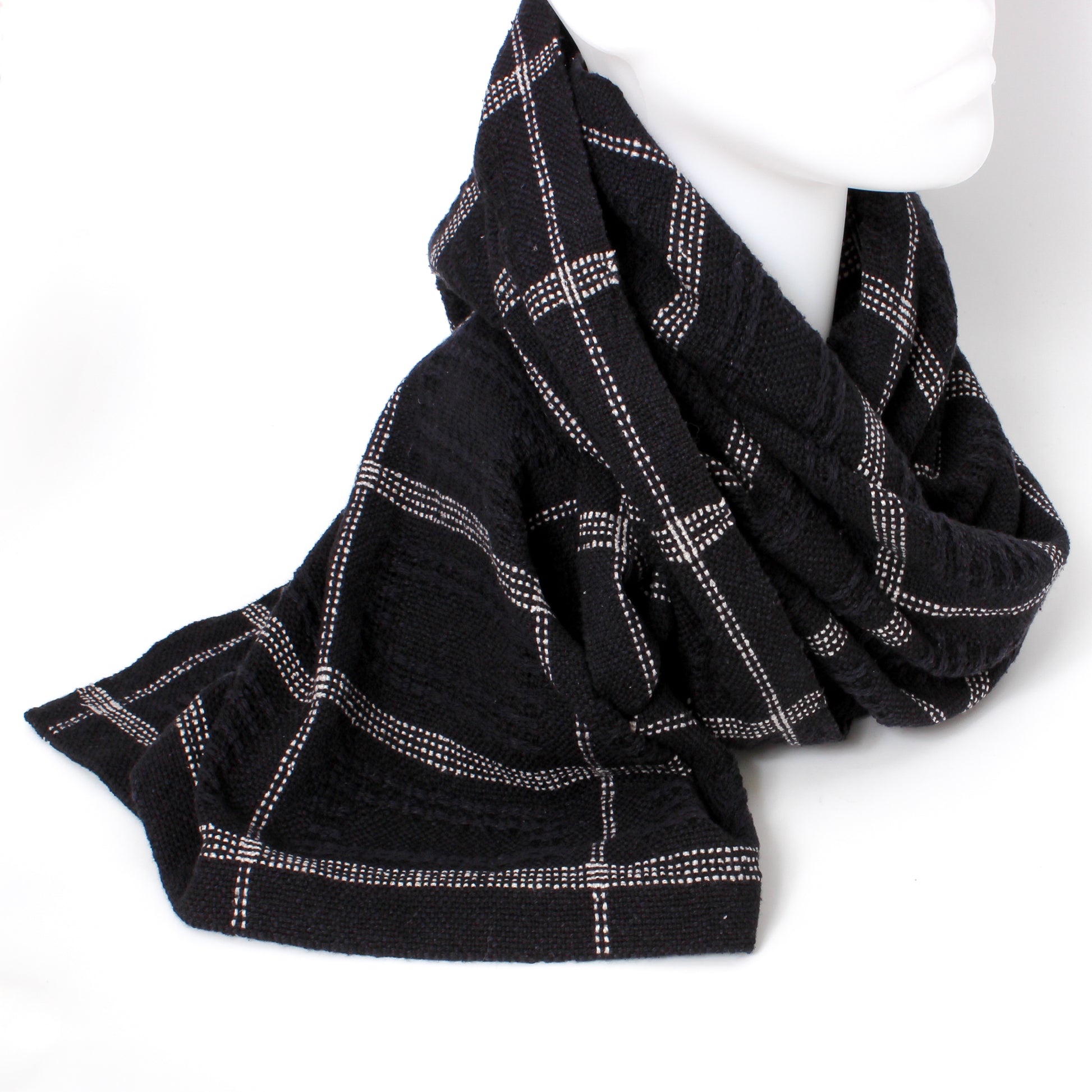 black scarf with white grids 