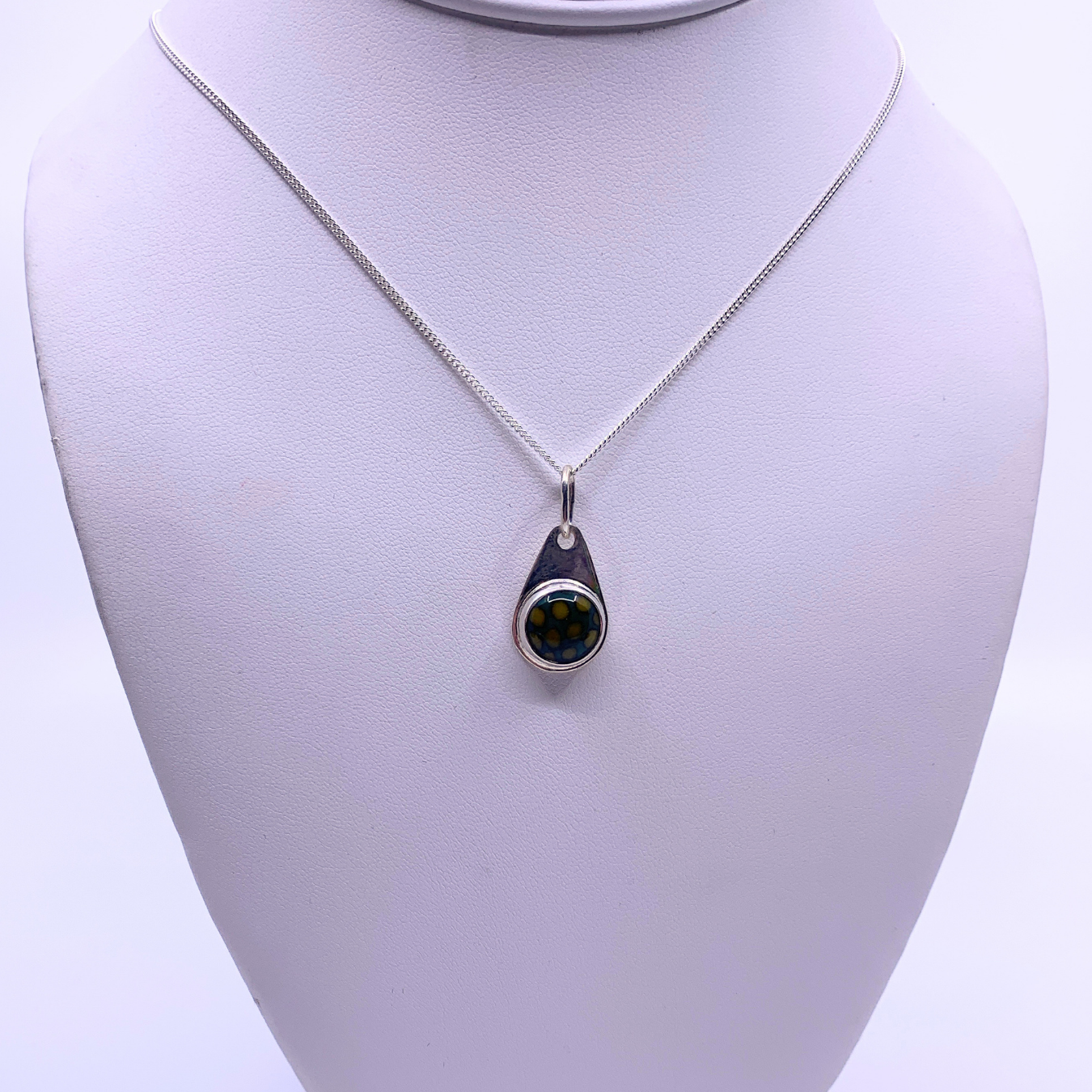 blue and yellow pendant 