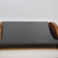 Shiny black stone serving tray with wood handles
