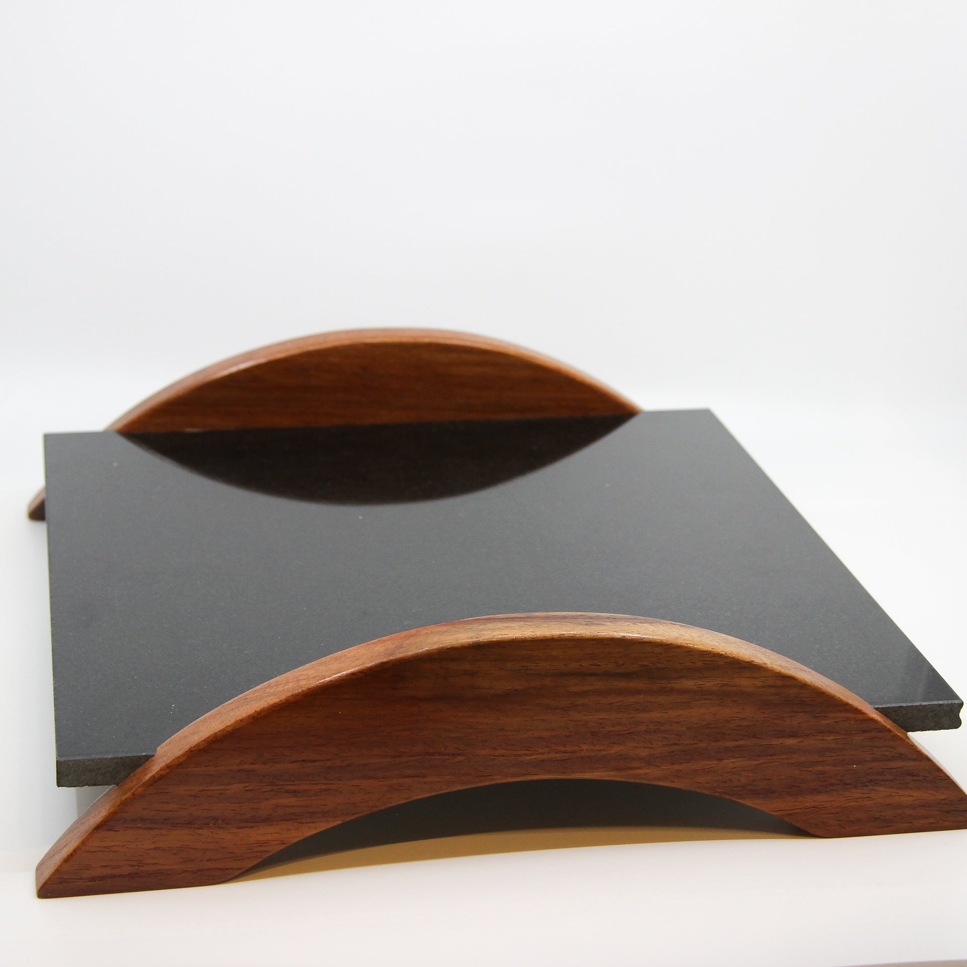 Shiny black stone serving tray with brown wooden handles