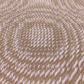 tan and white hand-woven scarf 