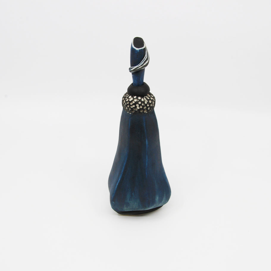 Dark blue pod bottle with stopper